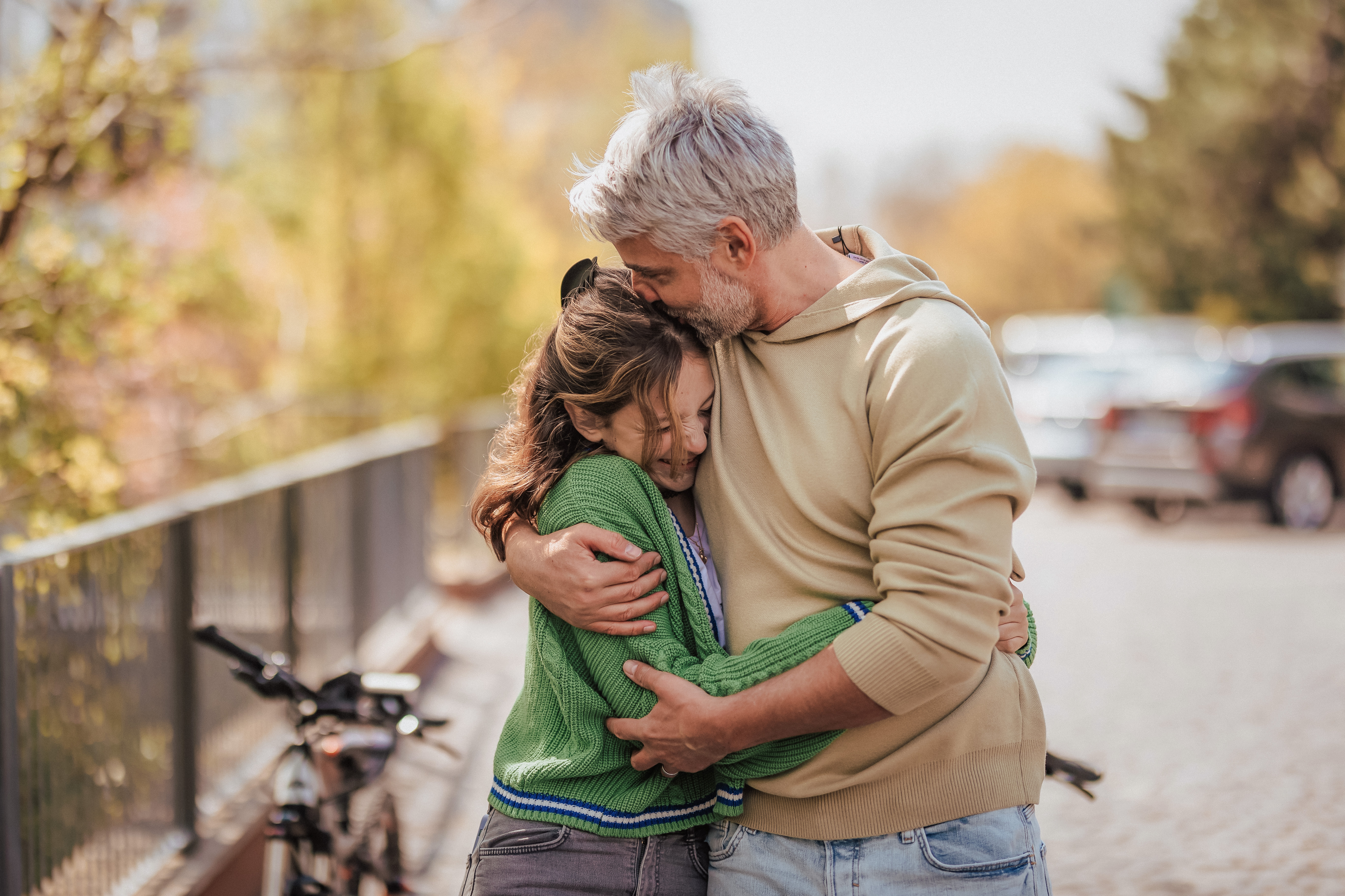 dad hugging teen daughter image how to survive perfectionism parenting live class